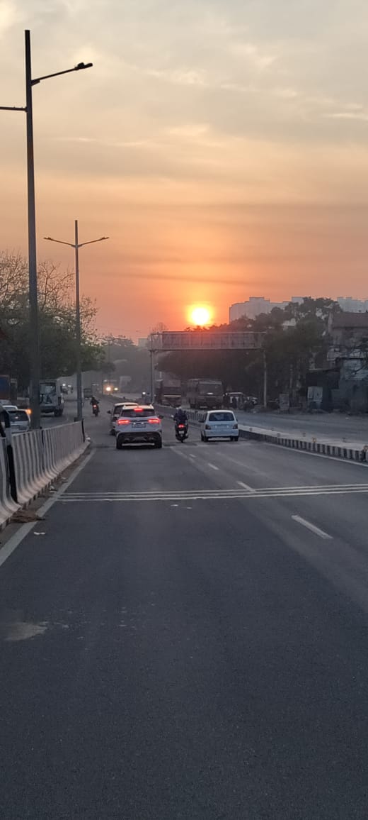 சூரியோதயம் FROM கோவை-திருச்சி ரோடு மேம்பாலம்