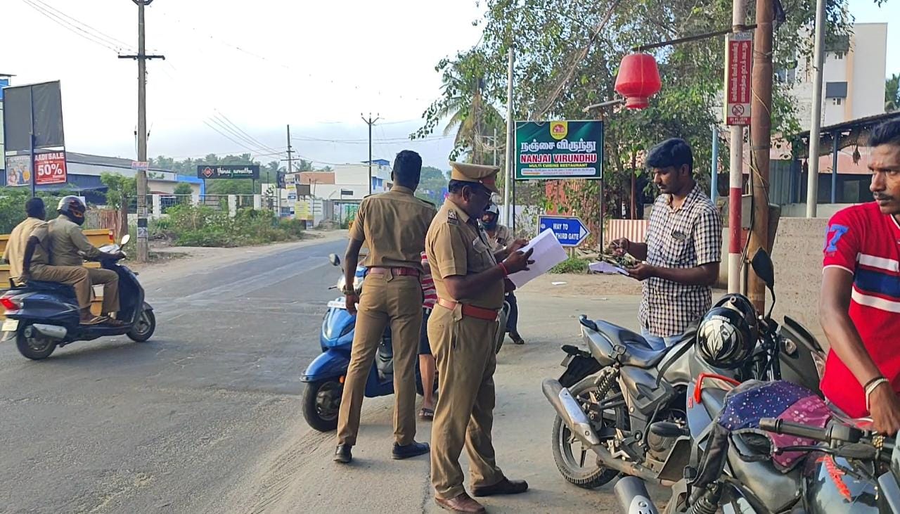 ஆர்.எஸ்.புரத்தில் போலீசாரை தாக்க முயன்ற வாலிபர் கைது